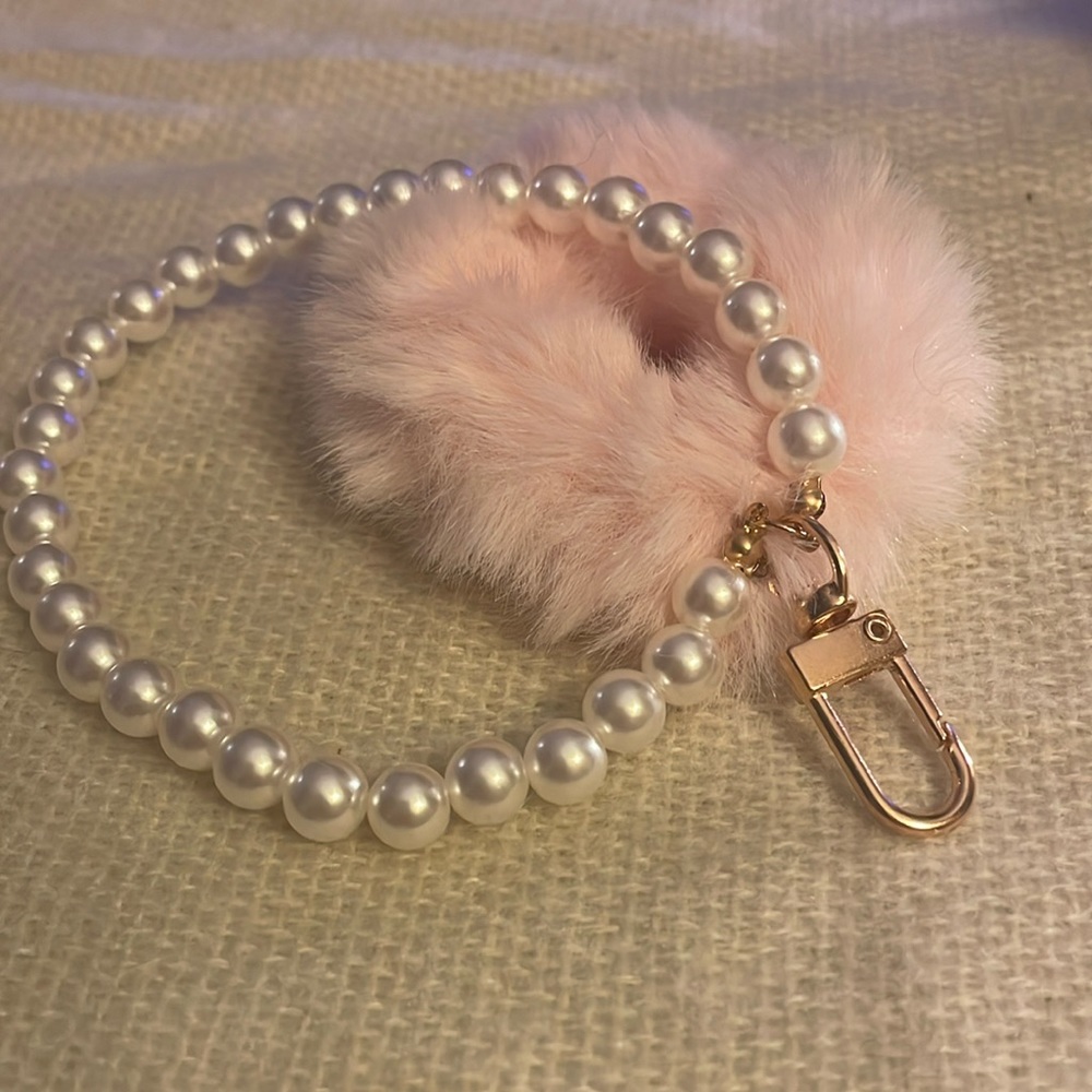Key ring with faux pearl and fuzzy wrist straps